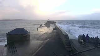 Wave breaking over Porthcawl Pier [upl. by Ahtnamys66]