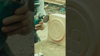 Watch Tominay Stone carve our AampE logo to life in stone stonecraft stonemasonry buildwithae [upl. by Elbertina204]