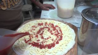 Frank Giaquinto Master PIzza Maker Opening a NY style dough ball with oil Part 1 [upl. by Notyep]