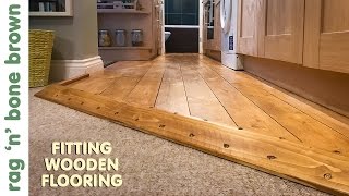 Laying Wooden Flooring In A Kitchen [upl. by Nerrag]