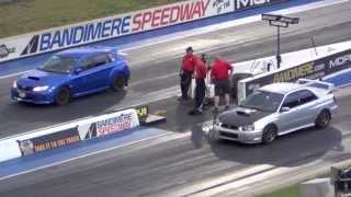 Subaru WRX Hatch vs Subaru STI Drag Race Battle [upl. by Ayatnohs]