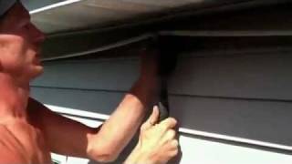 HOW TO REPLACE A DAMAGED PANEL OF VYNAL SIDING [upl. by Teeniv216]