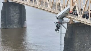 Drone video captures dramatic rescue of woman stuck in semi truck dangling over Louisville bridge [upl. by Bolten]