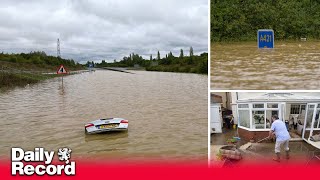 Flash floods hit parts of Britain as month’s worth of rain falls in 24 hour downpour [upl. by Ayikahs225]