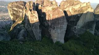 Experience the breathtaking and aweinspiring views of Meteoras stunning monastic cliffs in Greece [upl. by Ronica]