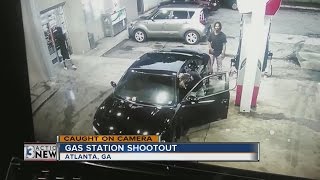 A gas station shootout in Atlanta caught on camera [upl. by Menashem]