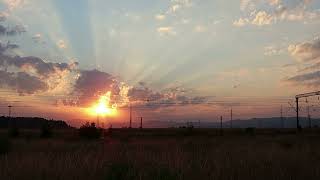 Romantic Sunrise Over Tranquil Landscape with Passing Train [upl. by Eednak]