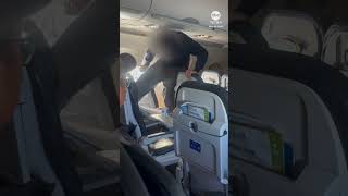 Disruptive passenger kicks chair on United flight from Austin to Los Angeles [upl. by Augustina234]