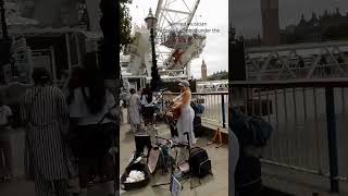 Charlotte Campbell talented musician under the London Eye today charlottecampbelllondon [upl. by Inaffets]