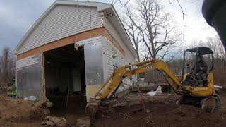 Installing a foundation under an existing building part 1 demo excavation footings [upl. by Comptom]