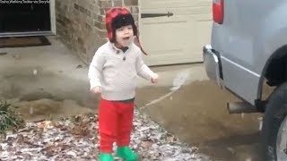 Wow Florida snowfall leaves toddler adorably in awe [upl. by Sivat]