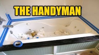 How To Caulk A Bathtub The Right Way  THE HANDYMAN [upl. by Zzahc]