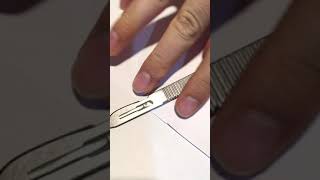 Surgical blade sharpness  scalpel vs paper [upl. by Dewees]