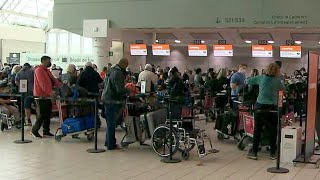 Sunwing network outage Travellers stranded chaos at airports [upl. by Idelia352]