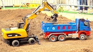 RC CONSTRUCTION MODELS amp RC TRUCKS IN MOTION CAT MOBILE EXCAVATOR [upl. by Yclek]