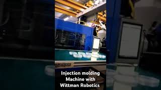 Injection molding Machine Running in fully automated with help wittmann Robot injection moulding [upl. by Netty]