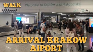 Arrival Krakow Airport and walk to the Airport train station [upl. by Ainollopa]