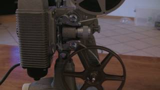 Loading and Rewinding an 8mm Projector Revere 85 [upl. by Sul729]