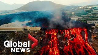 La Palma volcano Drone video shows quotlava lakesquot flowing as earthquakes rattle island [upl. by Rebliw]