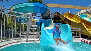 Indoor Waterpark  Child on a Water slide in the Water Park [upl. by O'Donnell]