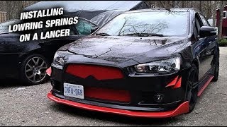 Installing lowering Springs On My Buddys Lancer [upl. by Ahsiekin]