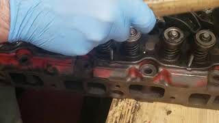 Installing valve stem seals and keepers on a Chevy [upl. by Hsak]