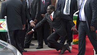 WATCH Robert Mugabe falls down steps in Harare [upl. by Shay]