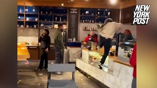 Airport employee leaps over counter fights managers and swings chair after she’s fired [upl. by Cleopatre]