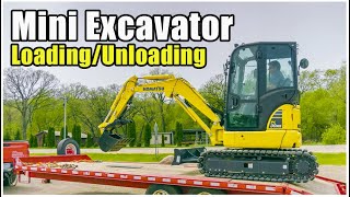 How to LoadUnload a Mini Excavator  Heavy Equipment Operator Training [upl. by Kathe]