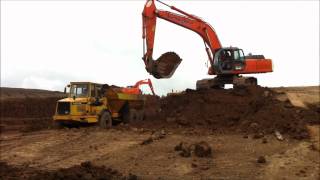 Hitachi EX350 excavator loading trucks [upl. by Womack]