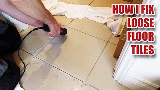 Fixing loose floor tiles and why they crack in new builds [upl. by Laeria]