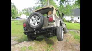 91 Jeep Wrangler YJ bone stock suspension flexarticulation [upl. by Dnana539]