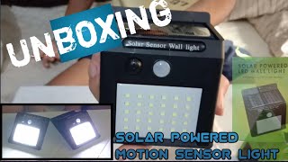 Unboxing shopee Solar powered LED Motion sensor wall light [upl. by Ecinad]