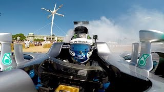 Epic F1 Donuts amp Burnouts Onboard at Goodwood [upl. by Elleined]