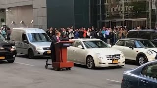 Melissa McCarthy as Sean Spicer drives podium through NYC streets [upl. by Inalan]