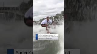 French gold medallist surfs the Seine [upl. by Demaria]