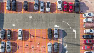 Car parking lot viewed from above timelapse Aerial view [upl. by Eadith]