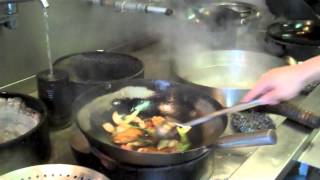 Cooking How to use a Chinese wok [upl. by Airdnua547]