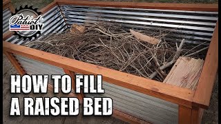 How To Fill A Raised Garden Bed Cheap [upl. by Atnauq]