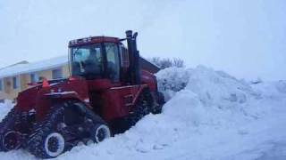 pushing snow case ih steiger stx535 quadtrac leon 4000 6 way blade [upl. by Aihsat]