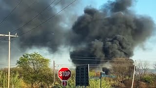 Tyres burning in Pretoria West in South Africa [upl. by Sirromal]