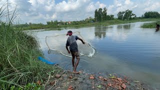 village man catching fish in the riverside fishcatch villagefisher [upl. by Obmar207]