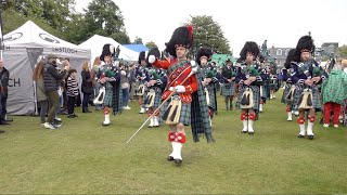 Drum Major Esson leads Ballater Pipe Band playing on the march into 2023 Aboyne Highland Games [upl. by Pieter227]