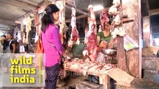 Women shop for prime cuts at meat market in Mizoram [upl. by Sualkcin]