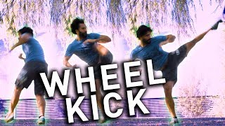 The Spinning Hook Kick Wheel Kick TUTORIAL [upl. by Eelibuj]