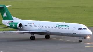 Carpatair Fokker F100 landing at Linz Airport YRFKB [upl. by Ynagoham]