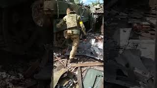 Ukrainian soldiers inspecting a destroyed Russian BMP3 [upl. by Chan771]