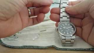 Adjusting a Rolex Oyster bracelet  Moving a link [upl. by Ilarin]