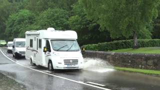 Vehicles Driving Through Flooding A93 Road Perthshire Scotland [upl. by Htebazile617]