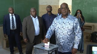 DR Congo President Felix Tshisekedi votes in Kinshasa  AFP [upl. by Clifford]